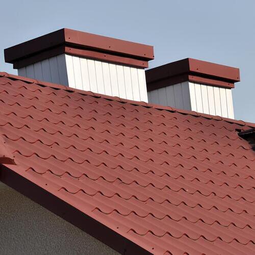 a home with a stone coated steel roof